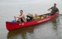 Geoff and Pam MacDonald, their sons, Jude and Rane, in tow, paddle their 20-foot Esquif Mirmachi canoe on Lake Couchiching. The MacDonalds set out to canoe across Canada from Victoria, B.C., in 2007 and will wrap up their voyage in Quebec City this August. ROBERTA BELL - THE PACKET & TIMES