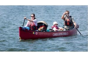 Pamela and Geoff MacDonald leave the marina in the Old Port of Montreal on Tuesday for the final leg of their canoe trip across Canada that began in 2007. Photograph by: Allen McInnis, Montreal Gazette
